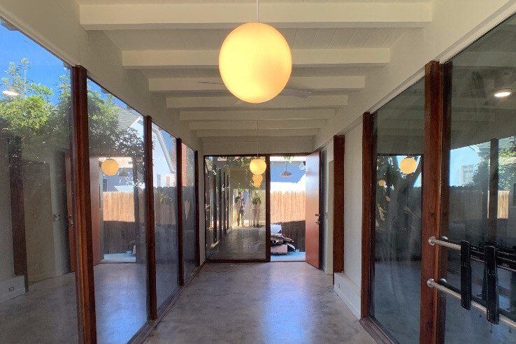 Floor to Ceiling glass windows in living room/sunroom - 4317 Westlawn Ave