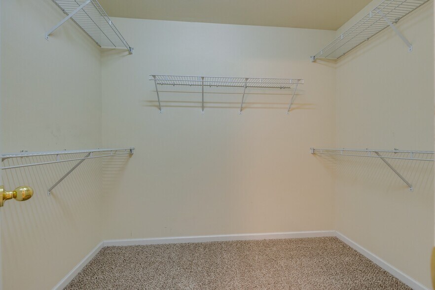 1 of 2 walk in closets in the Primary Bedroom - 4017 Cadence Dr