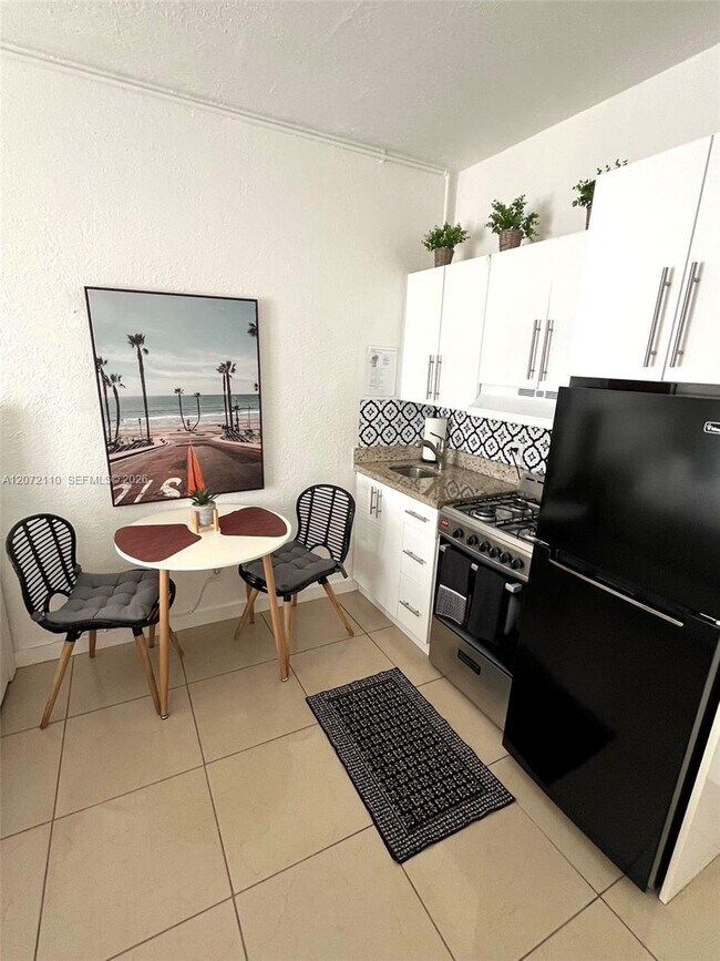 Building Photo - 3710 Collins Ave