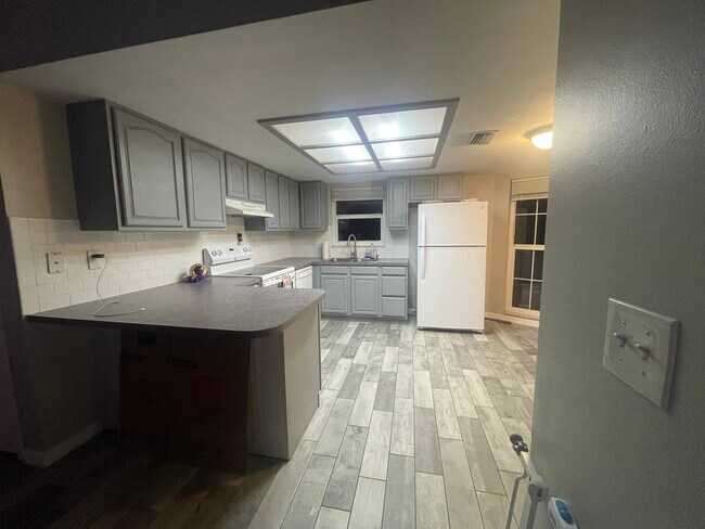 Kitchen opens to the family room - 6149 Staunton Dr