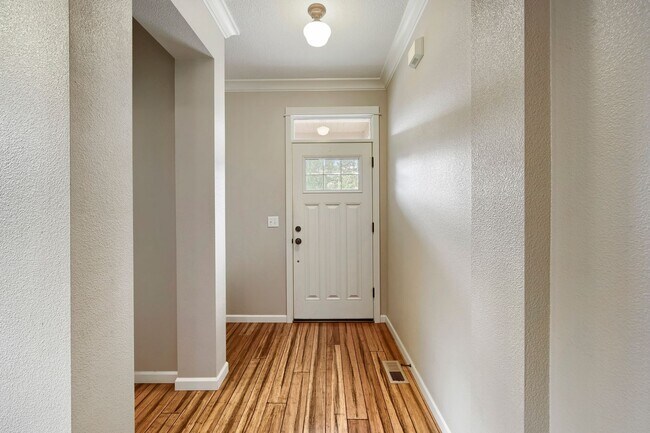 Building Photo - Custom-Built 4BR/2.5BA Two-Story Near Woodstock — Quartz Island Kitchen, Gas Fireplace & Fenced Y...