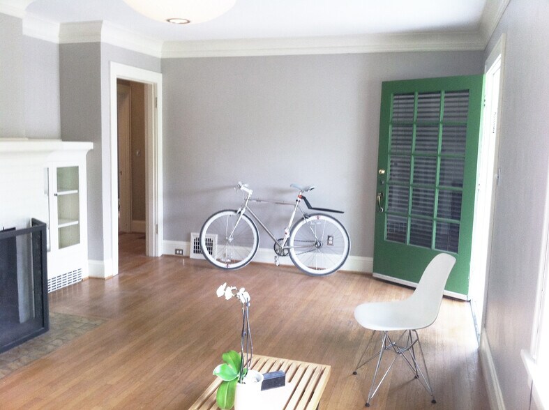 front room. doorway pictured is to the hallway to bedrooms and bathroom. - 4811 NE 31st Ave