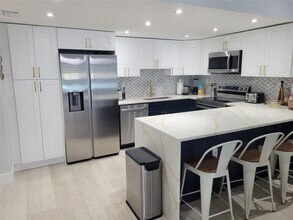 Building Photo - 19390 Collins Ave