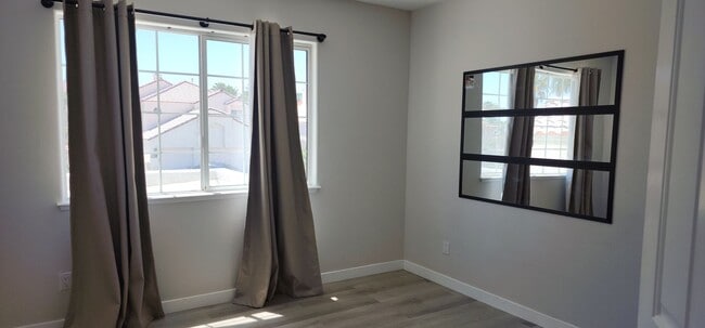 Building Photo - Spacious 4-bedroom Home Available in Desert Shores!