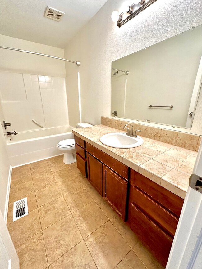 Building Photo - Spacious 4-Bedroom Home with Modern Comforts in Spanaway, WA