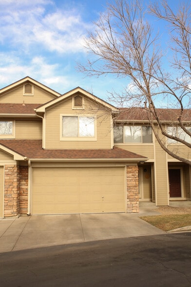 Attached 2 car garage. Water, lawn and snow removal covered by HOA dues paid by owner. - 2028 CENTENNIAL DR