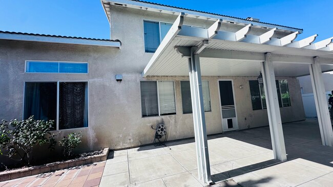 Building Photo - Spacious 4-Bedroom Home With 3-Car Garage ...