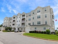 Building Photo - Pet Friendly Condo with Private Balcony and 1 Car Garage