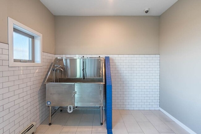 Building Photo - Edition- Spacious, Modern Kitchens in Pet-...
