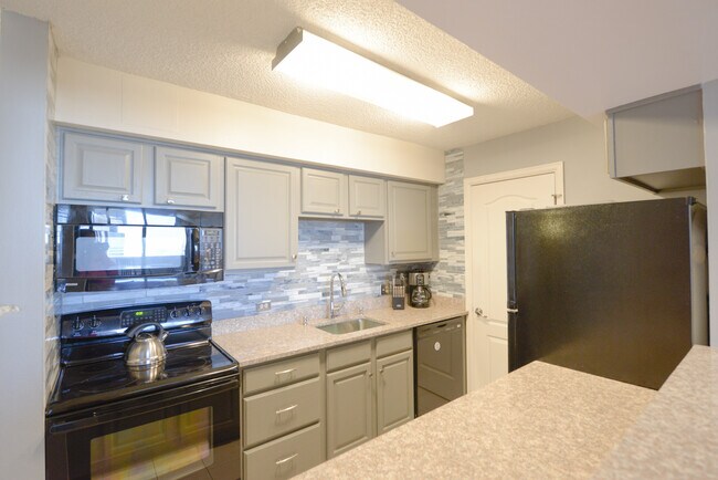 Kitchen with a stainless still appliances - 1020 15th St
