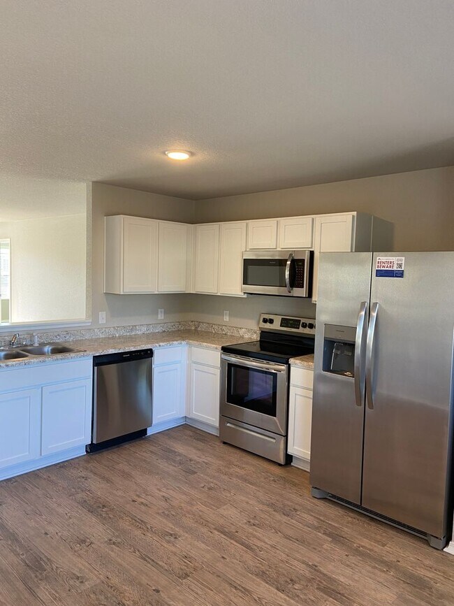 Building Photo - PRE-LEASING NOW | Stylish 4 Bed, 2 Bath Home in Conrad Court