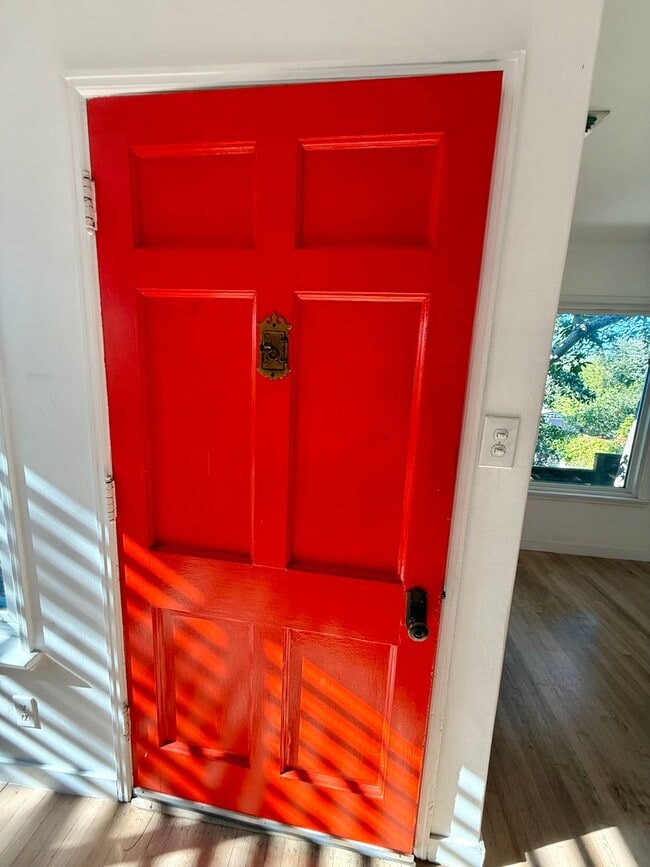 Building Photo - Hilltop Highland Park Sanctuary with Views, Private Gated Yard, In Unit Laundry, Parking & Abunda...