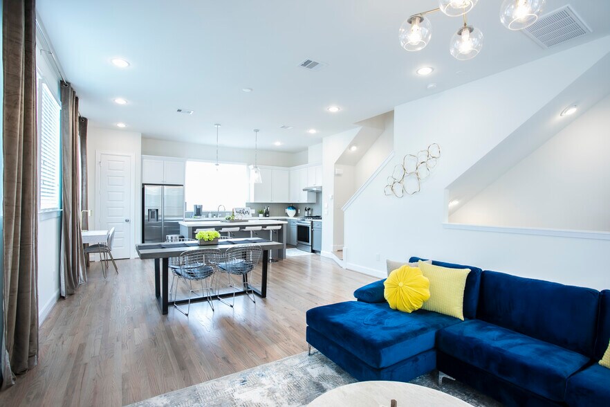 Looking into the dining room and kitchen area. - 2713 Eado Edge Ct