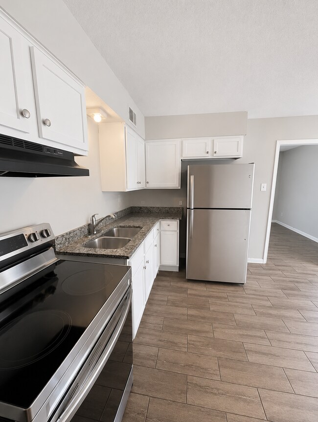 Building Photo - Charming 4BR-1BA Home! MOVE-IN SPECIAL + FREE 50" SMART TV!
