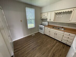 Building Photo - Two Bedroom Single Family Home