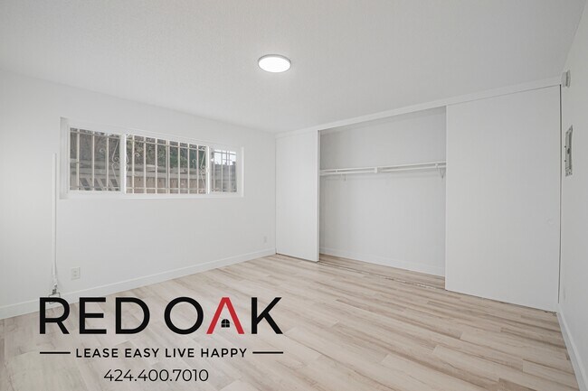 Building Photo - 211 S Ave 57