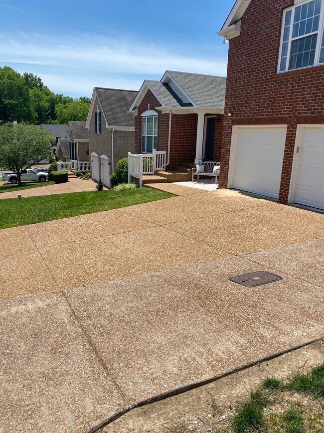 Extra parking pad and two car garage - 709 Warmstone Ct