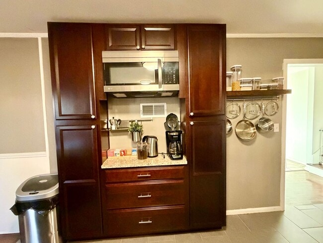 Building Photo - {7710} Prairie Village Split Level with Two Car Garage + Two Full Bathrooms + Hardwood Floors + U...