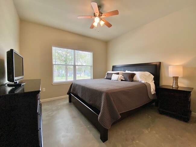 Building Photo - This charming two-story home, built in 2018, offers a spacious open floor plan perfect for casual...