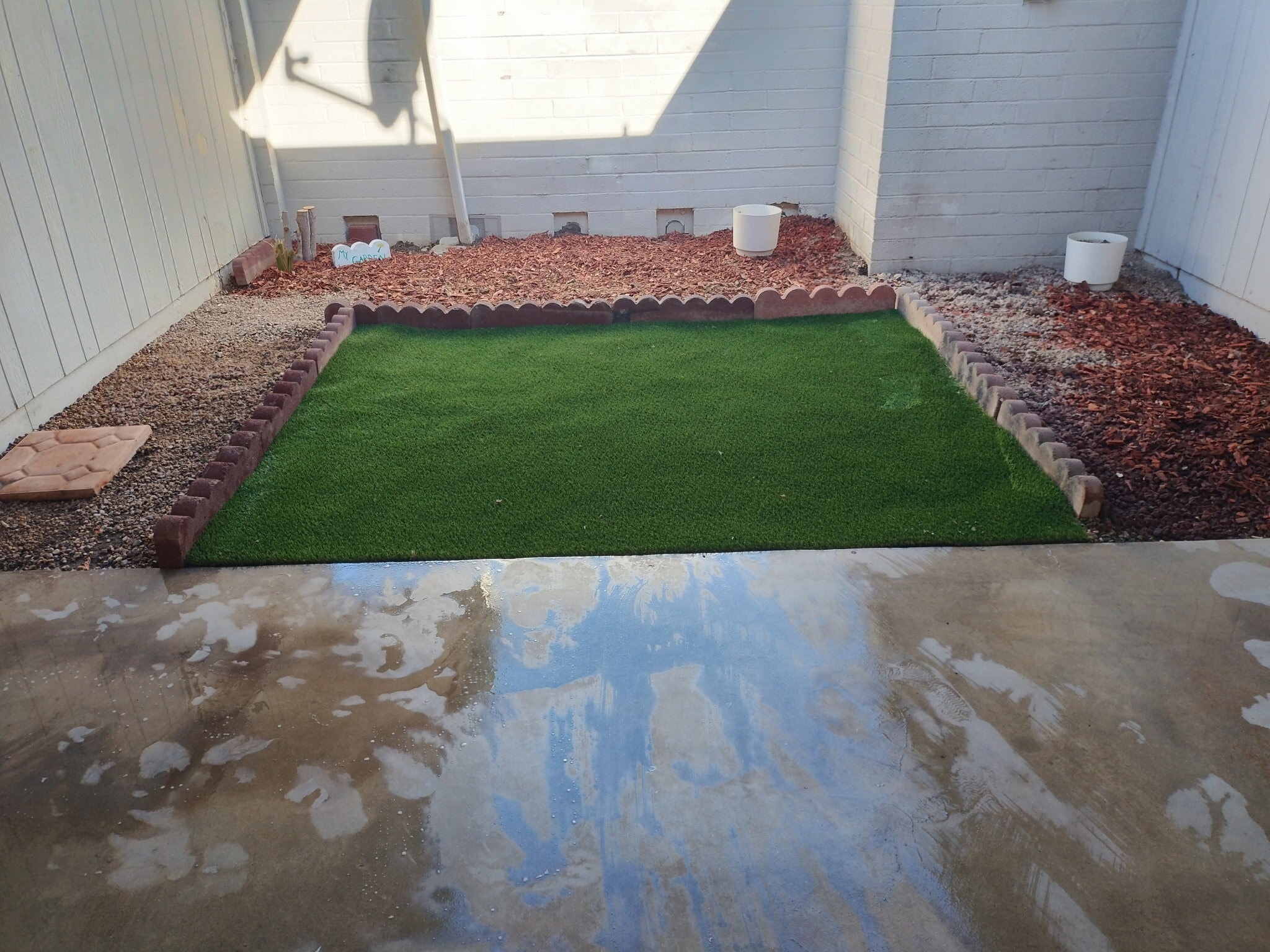 Outside patio ready for you to add your own touches - 10620 W Coggins Dr
