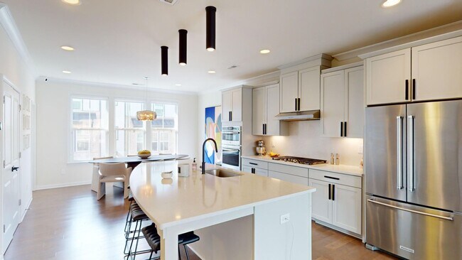 Building Photo - Beautiful Rooftop Terrace Townhome w/ gara...