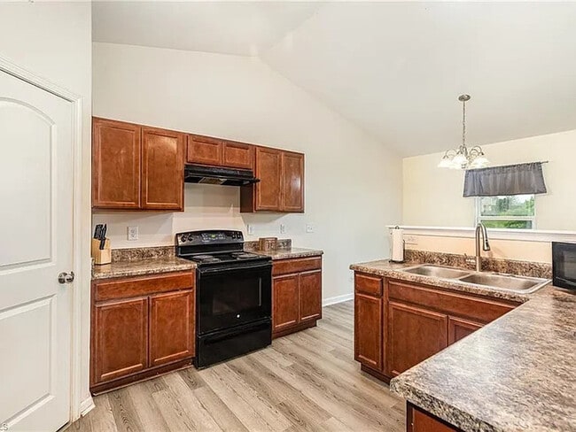 Building Photo - Earn Wealth While Leasing - Like a Homeown...