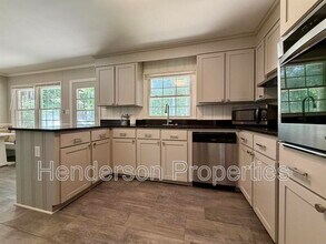 Building Photo - 6801 Woodland Cres