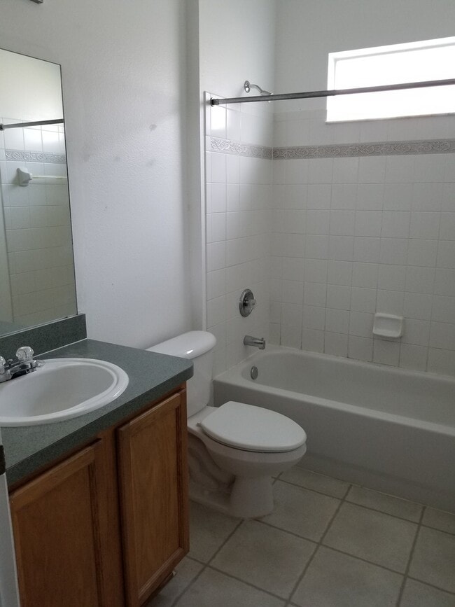 Building Photo - Lovely Four Bedroom with Pond View