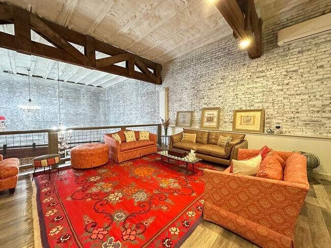 Building Photo - Fully Furnished & All-Inclusive Loft in Downtown South Boston – A True Show Stopper!