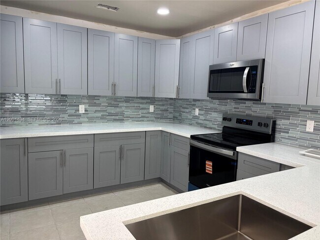 Building Photo - 5450 NW 94th Terrace