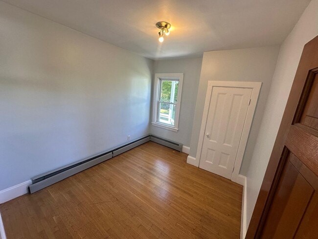 Building Photo - Updated Norwood 1st Floor Unit | Bright, S...
