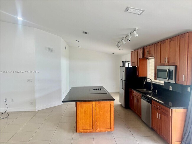 Building Photo - 14570 SW 145th Pl