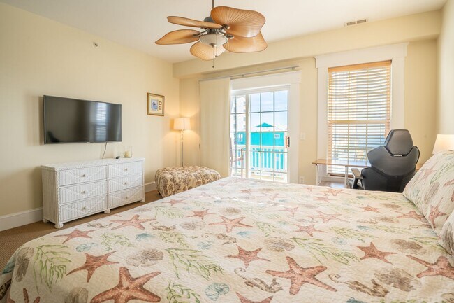 Building Photo - ENJOY OCEAN BREEZES FROM THIS FURNISHED OFF-SEASON OCEAN VIEW CONDO W/BALCONIES