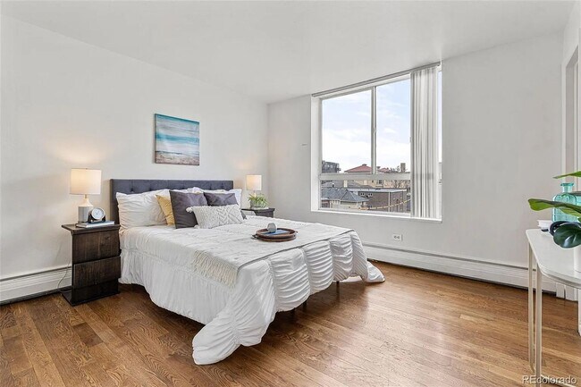Building Photo - Sunny Corner Condo in the Heart of Capitol Hill | 2 Bed • 2 Bath • 795 Sq. Ft.