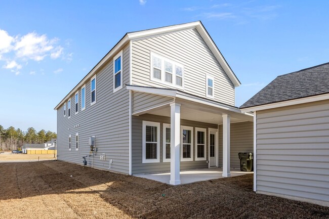 Building Photo - This brand-new home makes a statement from the moment you arrive!