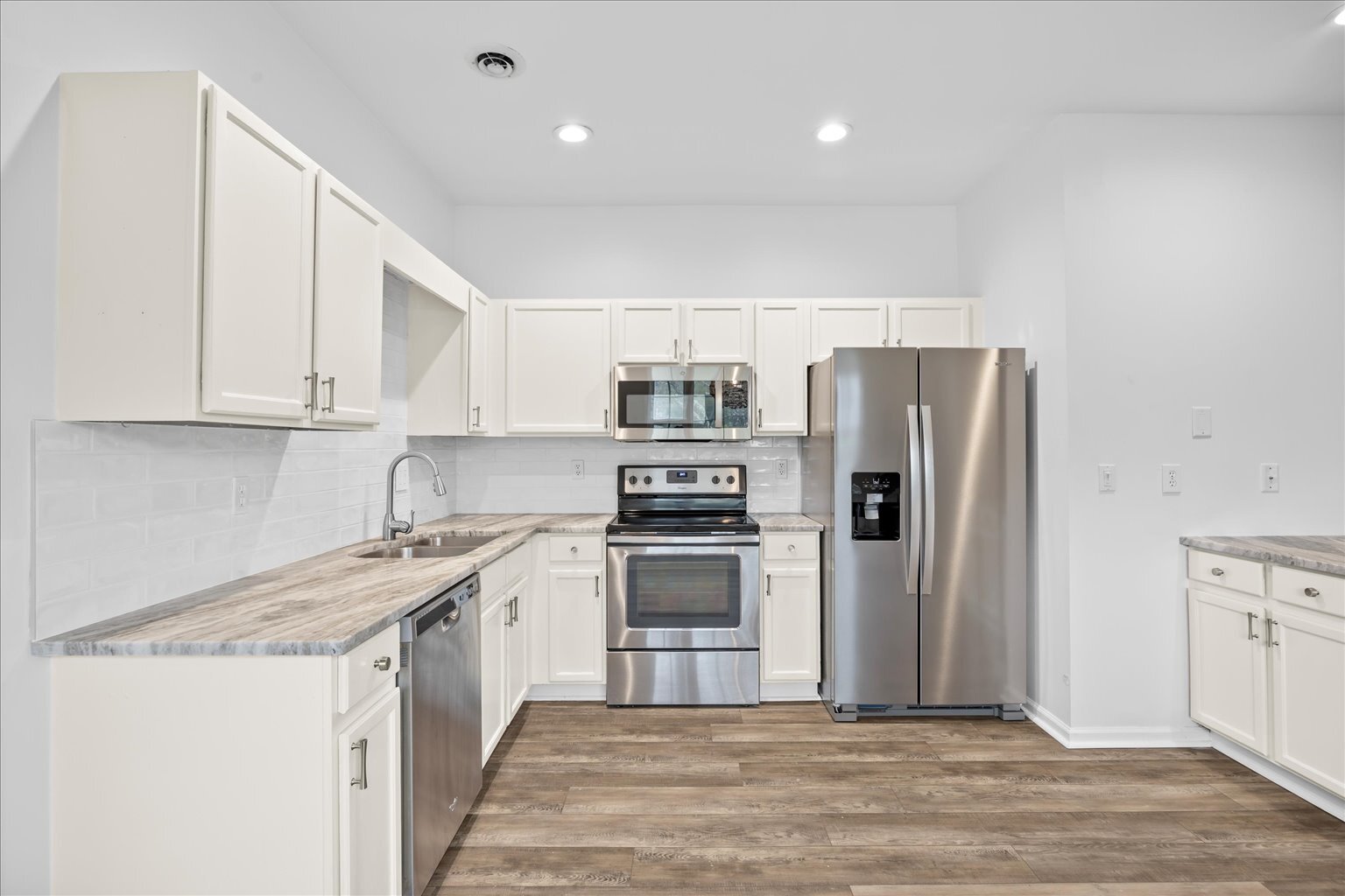 Large Kitchen with: Stainless Steel Appliances, New Granite Countertops,White Subway Tile Backsplash - 2204 Loblolly Ct