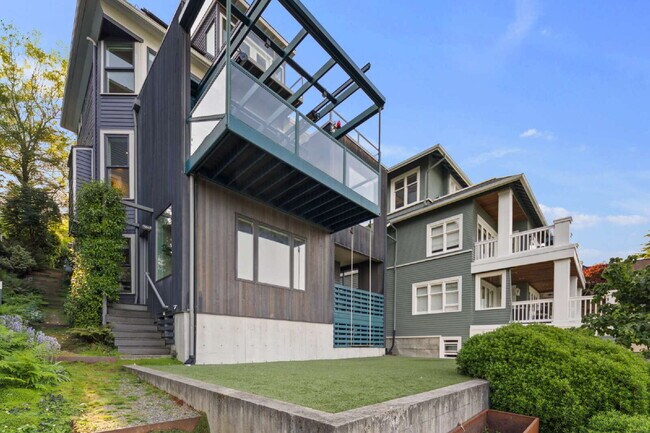Building Photo - Architectural Madrona Retreat with Panoramic Lake Washington Views, Solar & Detached Office- Avai...