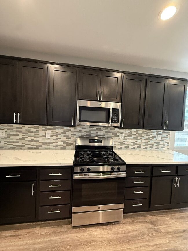 Building Photo - Beautiful Newer Two Story Home in The Gated Community of HG Gardens