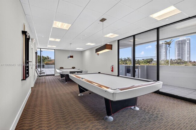 Building Photo - 3675 N Country Club Dr