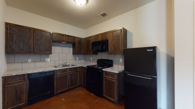 Building Photo - ALL STAINED CONCRETE FLOORING DUPLEX IN HA...