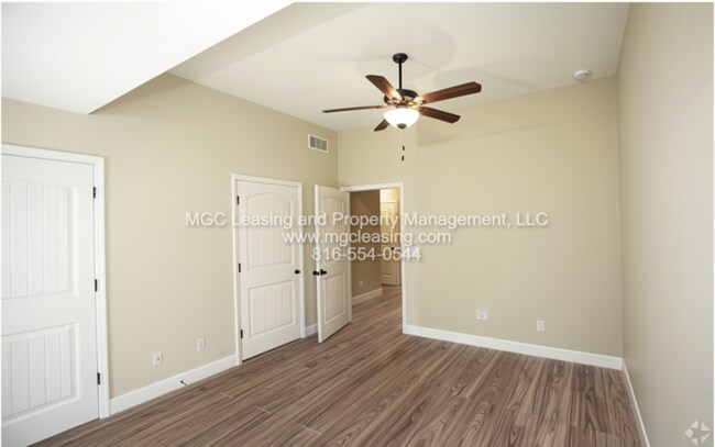 Building Photo - Eagle Creek Townhomes - Enjoy $50 off your monthly rent when you sign a 15-month lease.
