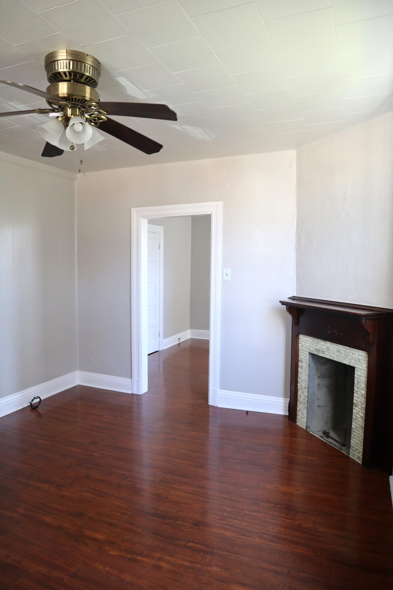 Hardwood floors flow throughout the first floor living room and dining room - 715 Clinton Pl