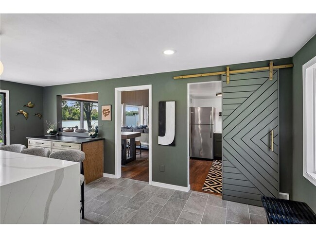 Building Photo - 5636 Twin Lake Terrace N