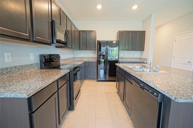 Building Photo - 6911 Breezy Palm Dr