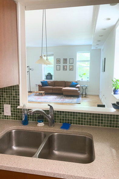 Kitchen window, view into living/dining area - 1810 Calvert St NW