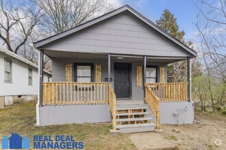 Building Photo - Charming 3-Bed Home - new paint, carpet an...