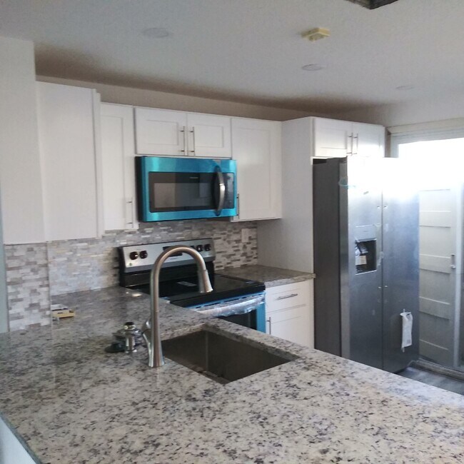 new appliances - 2811 NE 15th St
