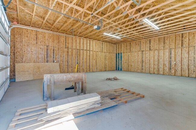 Building Photo - Newer Construction with 28X36 Shop!