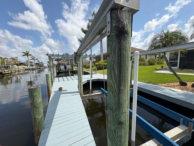 Building Photo - Beautifully Furnished Pool Home with Boat ...