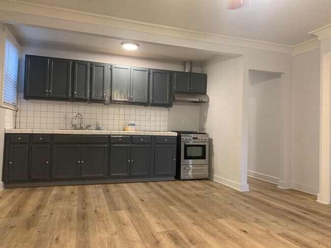 Building Photo - Great Experiences Are Just Around Rolland Curtis!